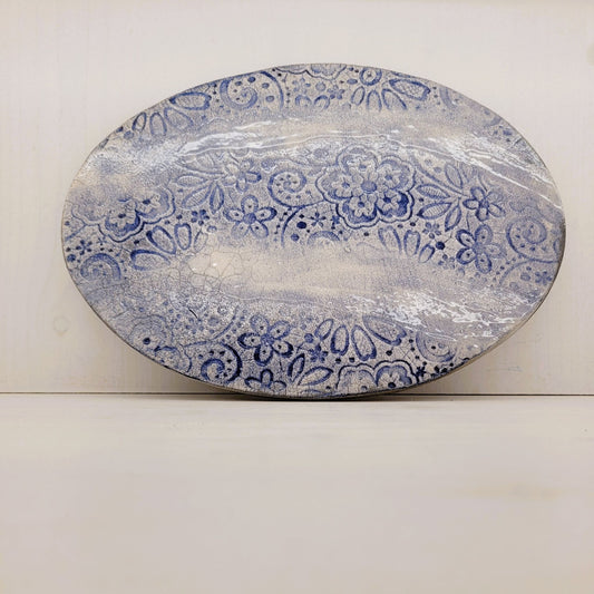 Dessous de Plat Dentelle Raku Bleu : L'Élégance Antique