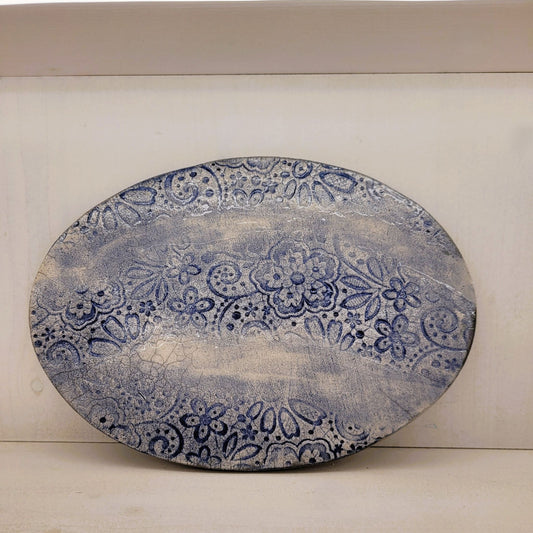 Dessous de Plat Dentelle Raku Bleu : L'Élégance Antique