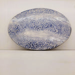 Dessous de Plat Dentelle Raku Bleu : L'Élégance Antique