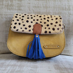 Sac Lena Soruka en Croûte de Cuir : Imprimé animalier, Pompon Coloré & Multi-Soufflets
